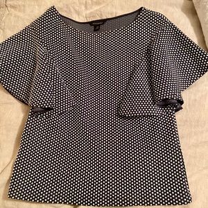 Blue and white polka dot shirt